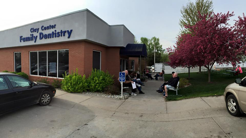 Patients waiting in front of Clay Center Family Dental Care for dental treatment on Clay Center Dental Mission day
